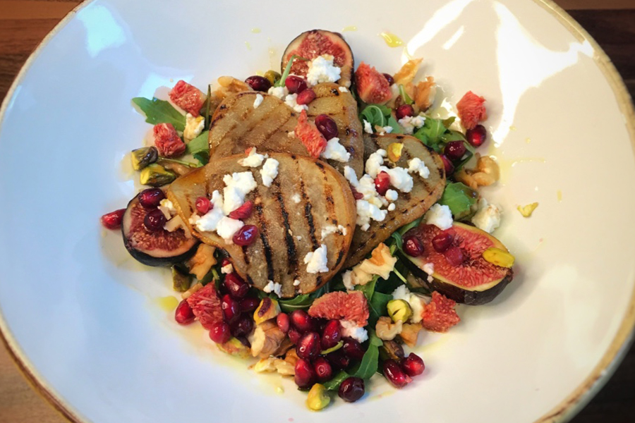 Warm griddled pear, fig and feta salad with pomegranate seeds